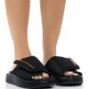 AZALEA WANG CALICO FLAT SLIP ON SANDAL IN BLACK