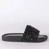 TWISTED LOVE FLAT SANDAL IN BLACK